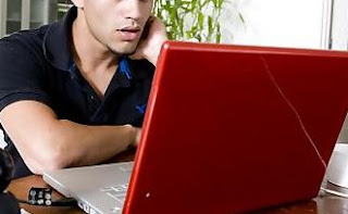 Man looking at porn on computer.