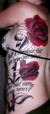 Big Rose Flower Tattoo design on ribs
