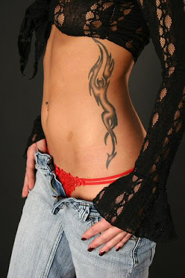 Tribal tattoo on Side of this hot lady
