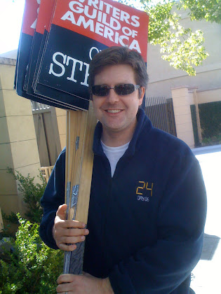 Even the Stoic Writer, with his trademark sheaf of signs, cracks a smile in expectation...