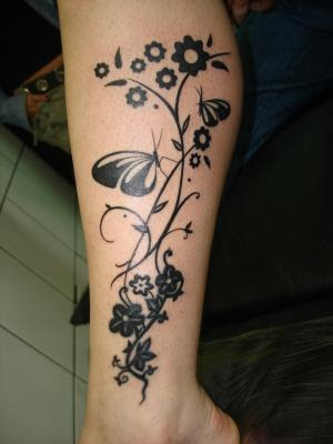 tattoo style is diverse types of flowers. Posted by tattoo design at 8:11 AM