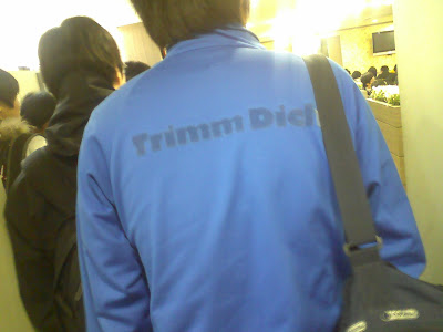 Trimm Dich slogan on Adidas jacket