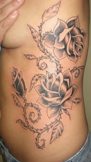 Side Body Black Ink Flower Tattoo Design