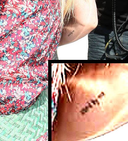 Hilary's newest (sixth) tattoo is on her right arm.