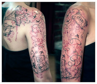 musical tattoo. cool music tattoos with