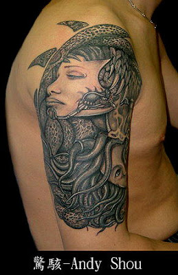 sea people tattoo on the arm