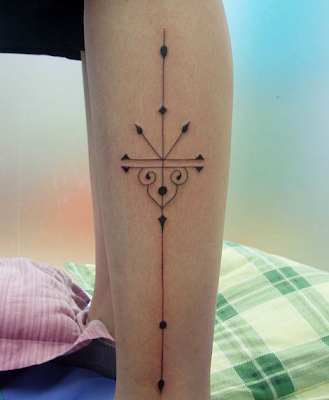 pretty abstract tattoo design on the leg