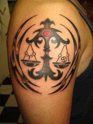 Libra tattoo design on the arm
