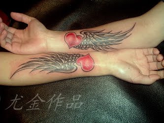 lovers tattoo with angel wing and heart