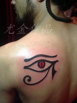 eye tattoo on the shoulder