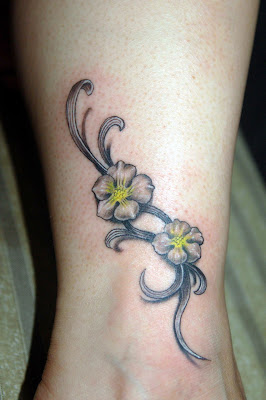 flower tattoo on the leg