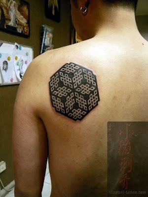 illusion tattoo design on the back