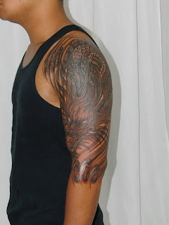 free dragon tattoo design on the arm