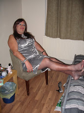 Silver dress and fishnets