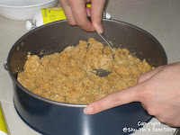 Mixing Butter and Crushed Biscuits
