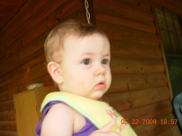 LEAH OUTSIDE SWINGING AT NANA'S