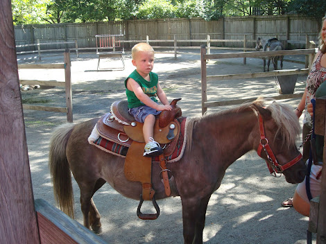 Brady's riding Betsy the pony