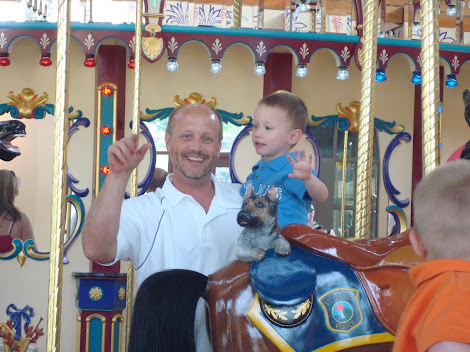 Papa and Coby on the Carousel in St. Joseph
