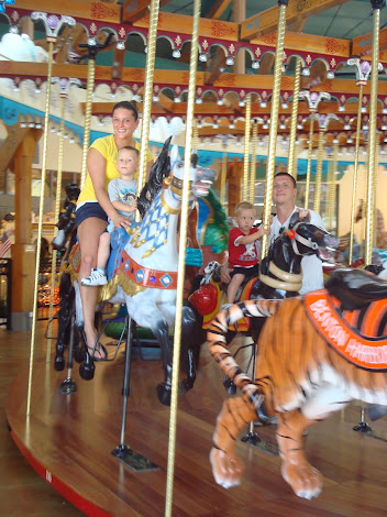 Aunt Britt, Daddy and the boys riding the Silver Beach Carousel