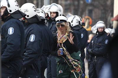 Riot police and girl in helsinki