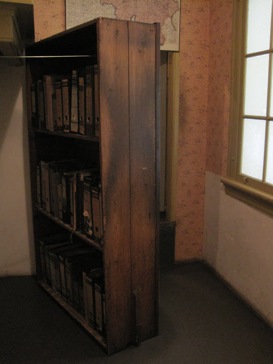 The Bookcase that hid the annex in Anne Frank's house.