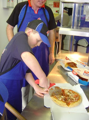 Domino's Pizza Cutting