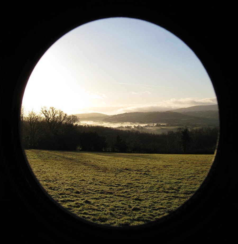 [porthole+sunrise.jpg]