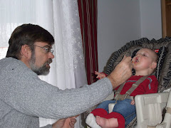 Grandaddy bird feeding the baby bird