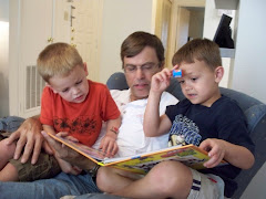 Grandad reading with Ethan and Aston on his birthday