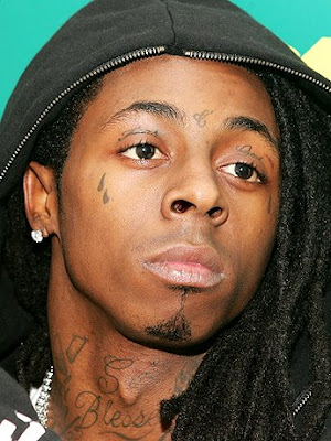 too funny his 3 tear tattoos. Lil Wayne Face Tattoo He has replaced his tear 