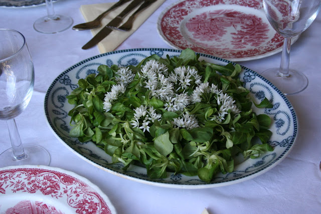 Wild garlic flower salad with walnut oil and dijon mustard dressing