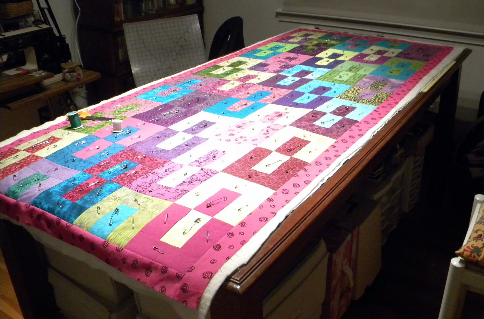 The Quilted Librarian Pin basting the yoga quilt