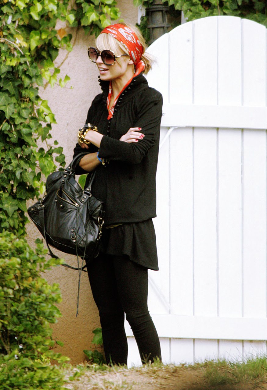 Nicole Richie wearing Chanel Vintage Quilted Black Backpack and Vans Sk-8  Hi Core Classics Sneakers
