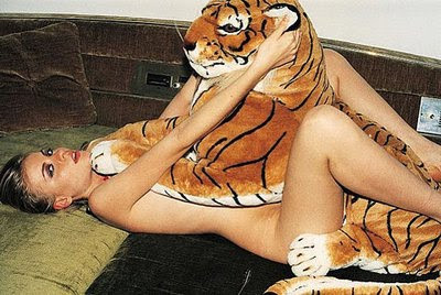 woman-with-tiger-stuffed-animal-nude-naked-topless.jpg