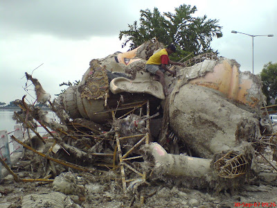 Ganesha idol being dismantled