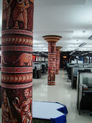 Painted pillars in Tenth Planet office