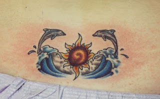 Dolphin Tattoos Design lower back