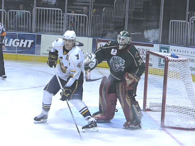 Peoria scoring ace Steve Regier stands his ground in front of the Houston Aeros' net ('St. Louis Game Time' photo by Brian Weidler)