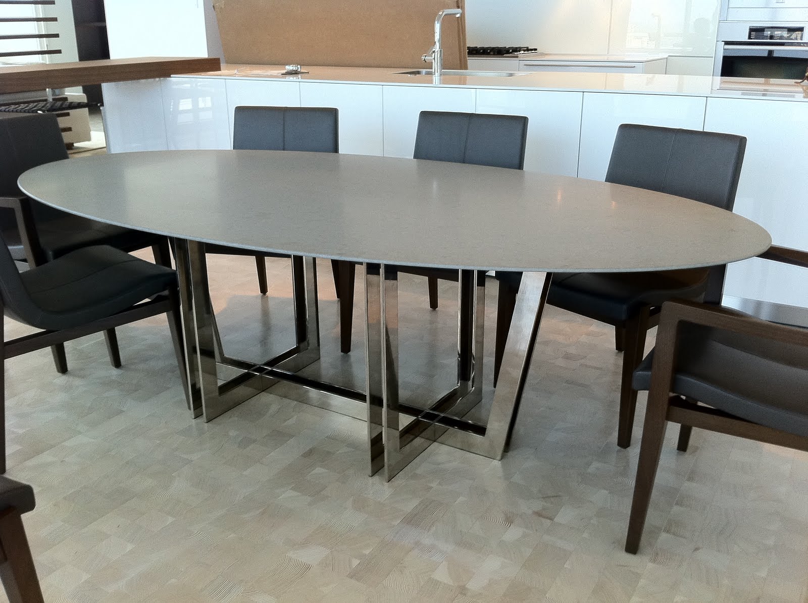 robert n. wohlfeld Caesar stone and polished nickel dining table.