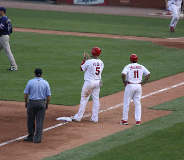 Albert Pujols and Jose Oquendo