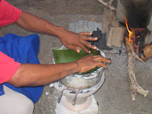 covering  it with banana leaves