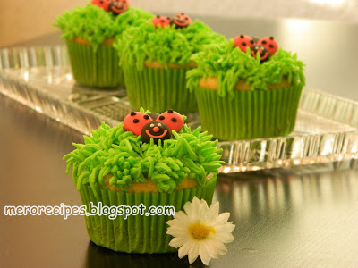 Vanilla Cupcakes with grass shaped frosting