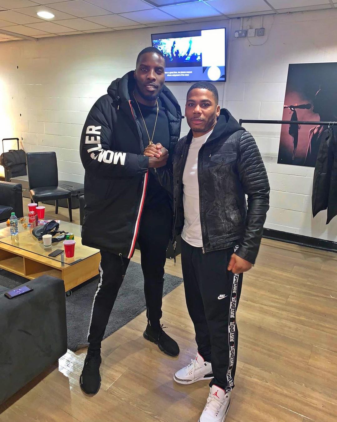 Picture Of Lawrence Okolie Standing Tall At Feet Alongside Nelly