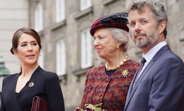 Crown Princess Mary wore a crepe knit wrap jacket by Scanlan Theodore. Queen Margrethe, Princess Benedikte, Prince Frederik