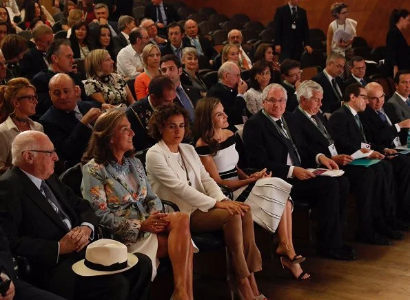 Queen Letizia wore Carolina Herrera Striped Off The Shoulder Knit Dress and Carolina Herrera sandals