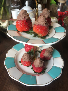 Chocolate covered strawberries on fancy tray