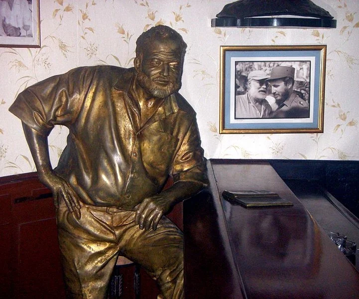 Ernest Hemingway at the bar in El Floridita, Havana -  Sculpture by Cuban sculptor José Villa Soberón, 2003