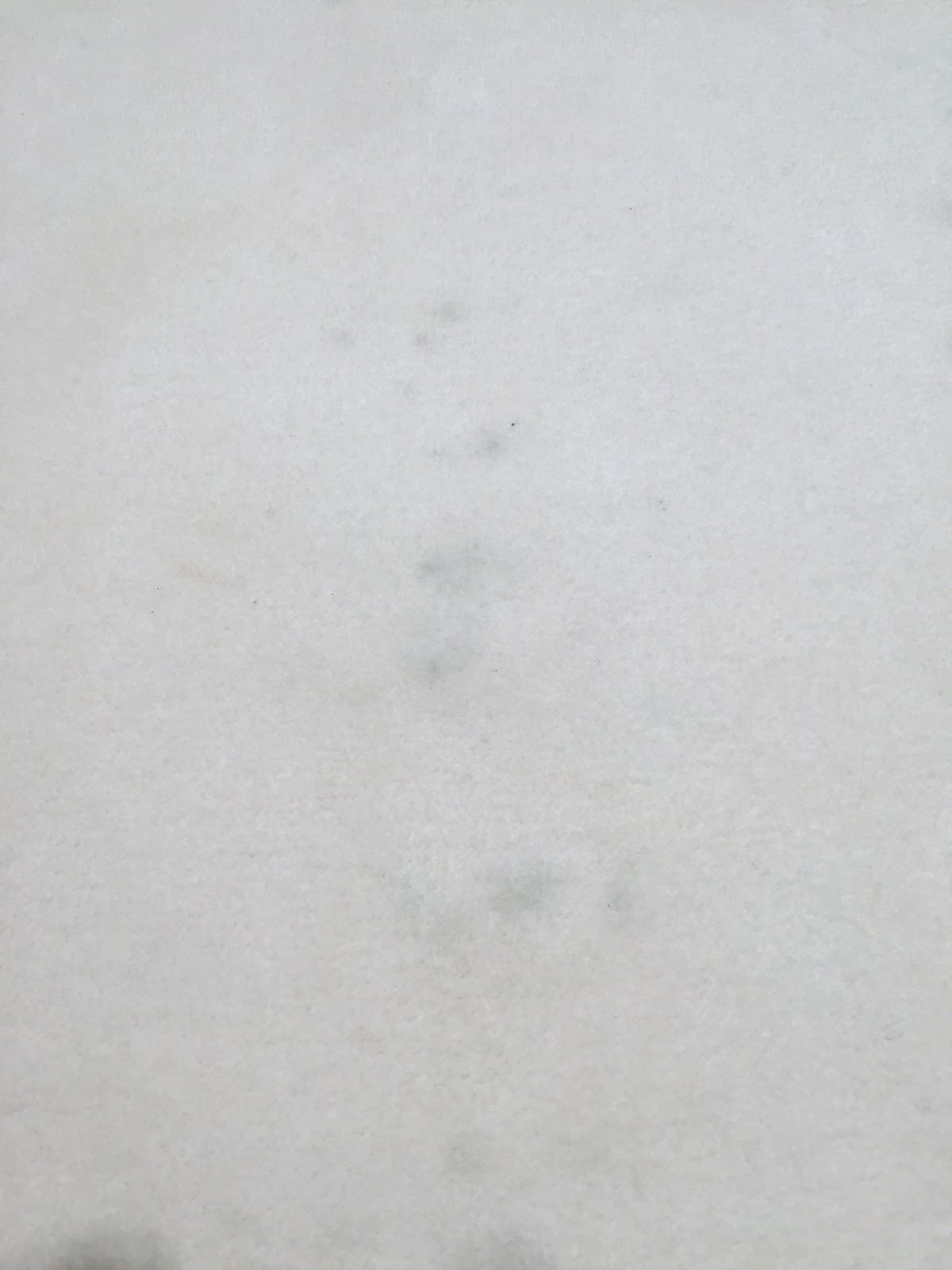 What are these strange black fleck marks on my carpet? Art of Clean