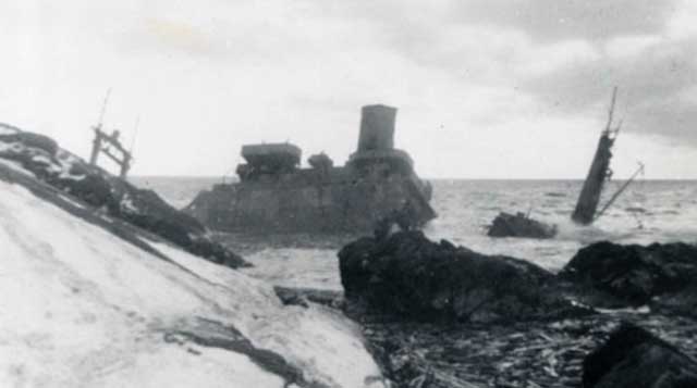 USS Pollux breaking up, 18 February 1942 worldwartwo.filminspector.com