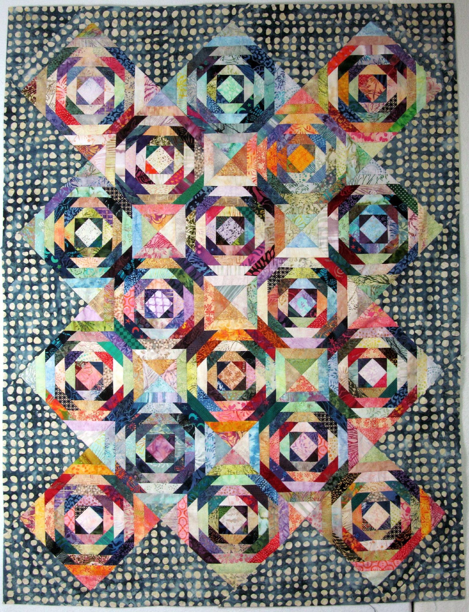 Exuberant Color Batik Pineapple Log Cabin quilt top sewn.............